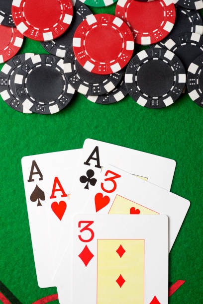 Mobile phone displaying live score updates and live casino table side by side